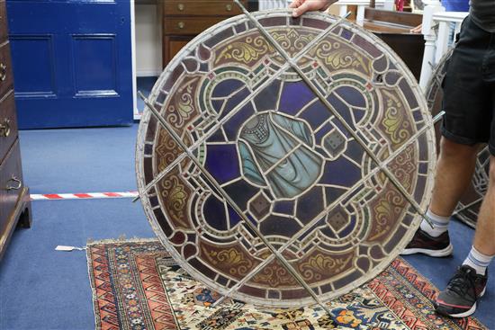 A set of eleven 19th century stained glass roundels, diameter 24in.